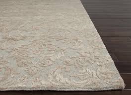 Professional cleaning of a wool carpet using safe methods for natural fiber rugs
