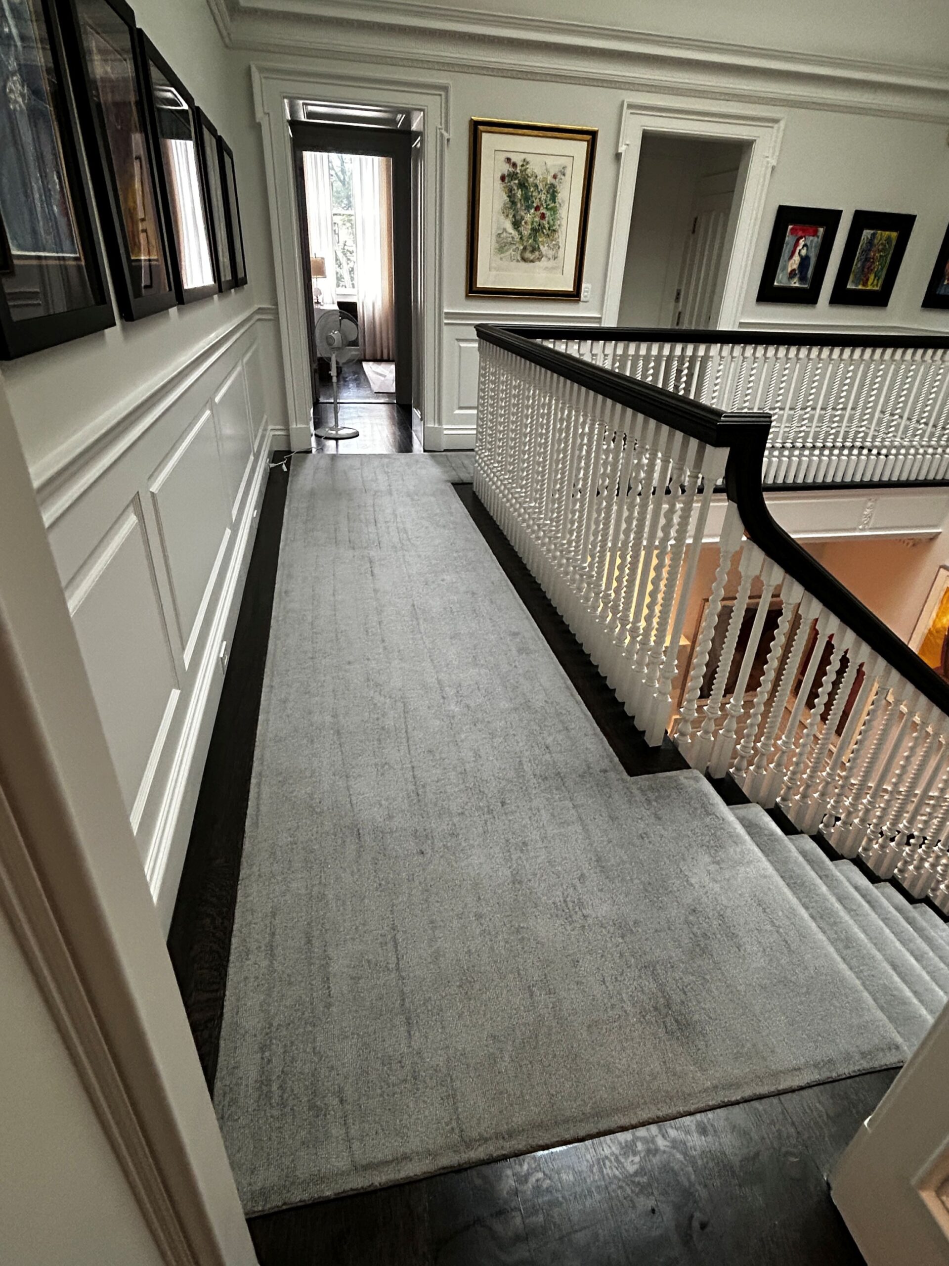 Gray carpeted hallway cleaned by a professional carpet cleaning service in Reading MA